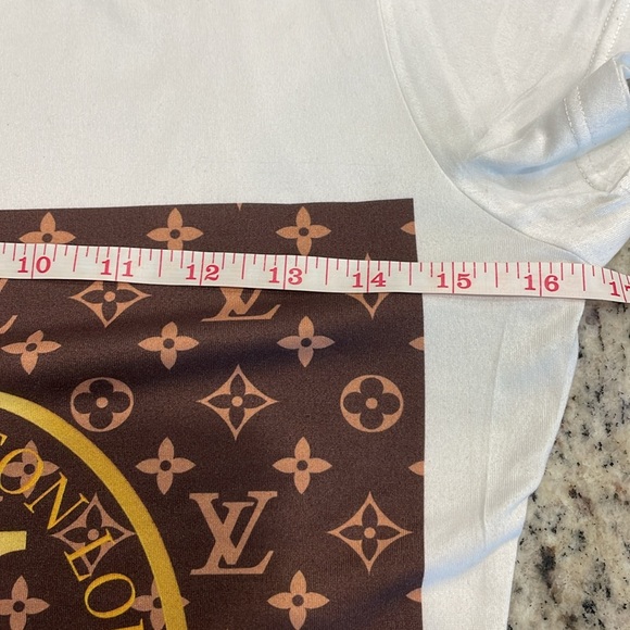 White cap sleeve tee with LV logo. No care tags. Feels like rayon/cotton blend. - Picture 6 of 11